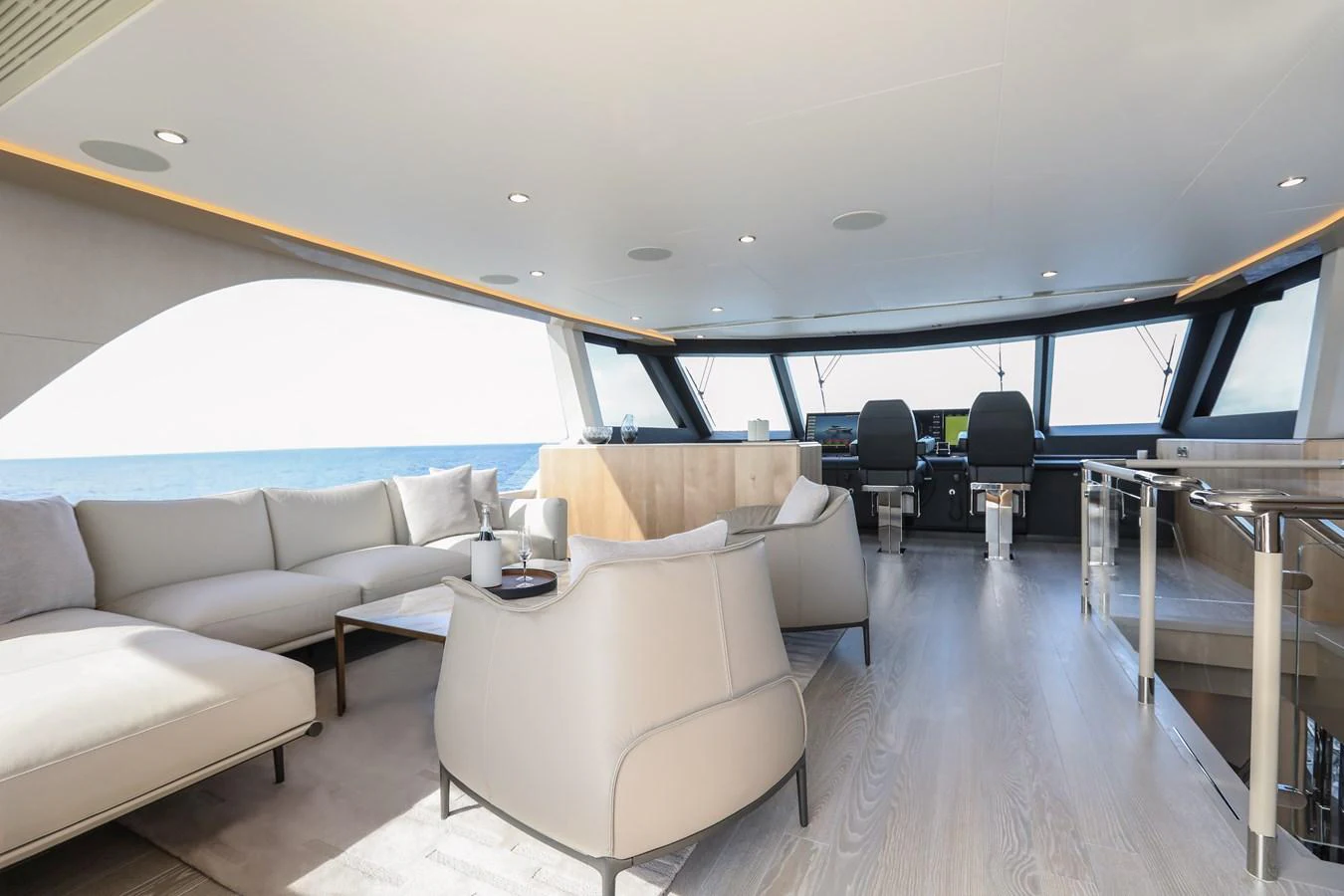 The spacious salon offers a luxurious and modern setting with ample seating and panoramic views. aboard OCEAN ALEXANDER 28L Yacht for Sale