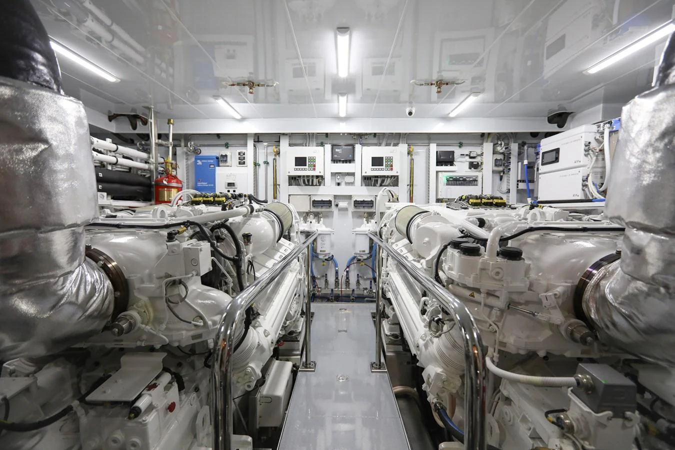 The yacht's engine room showcases powerful, well-maintained machinery and advanced systems. aboard OCEAN ALEXANDER 28L Yacht for Sale