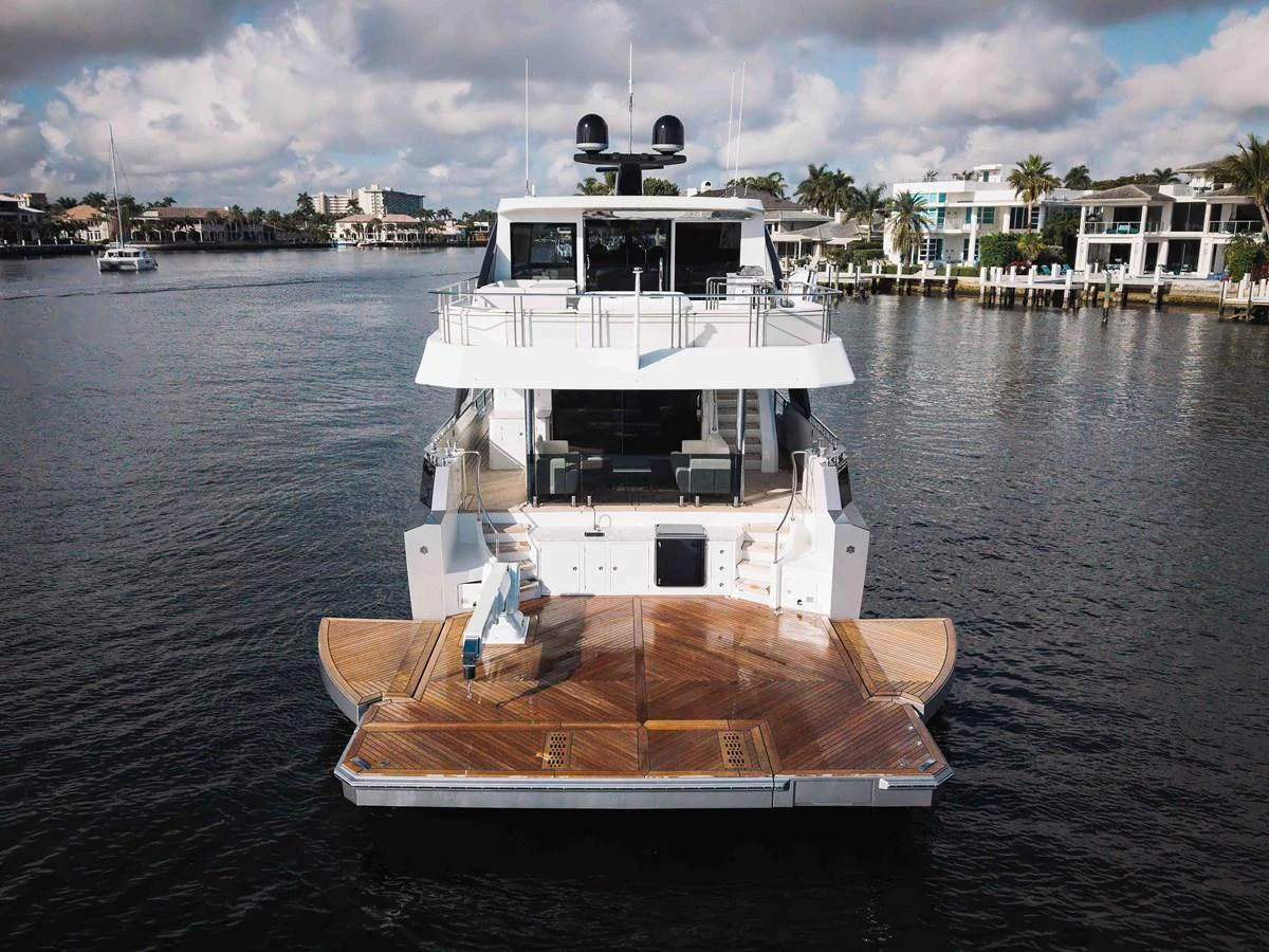 The yacht's spacious aft deck offers a luxurious area for relaxation and entertainment. aboard CHAOS Yacht for Sale