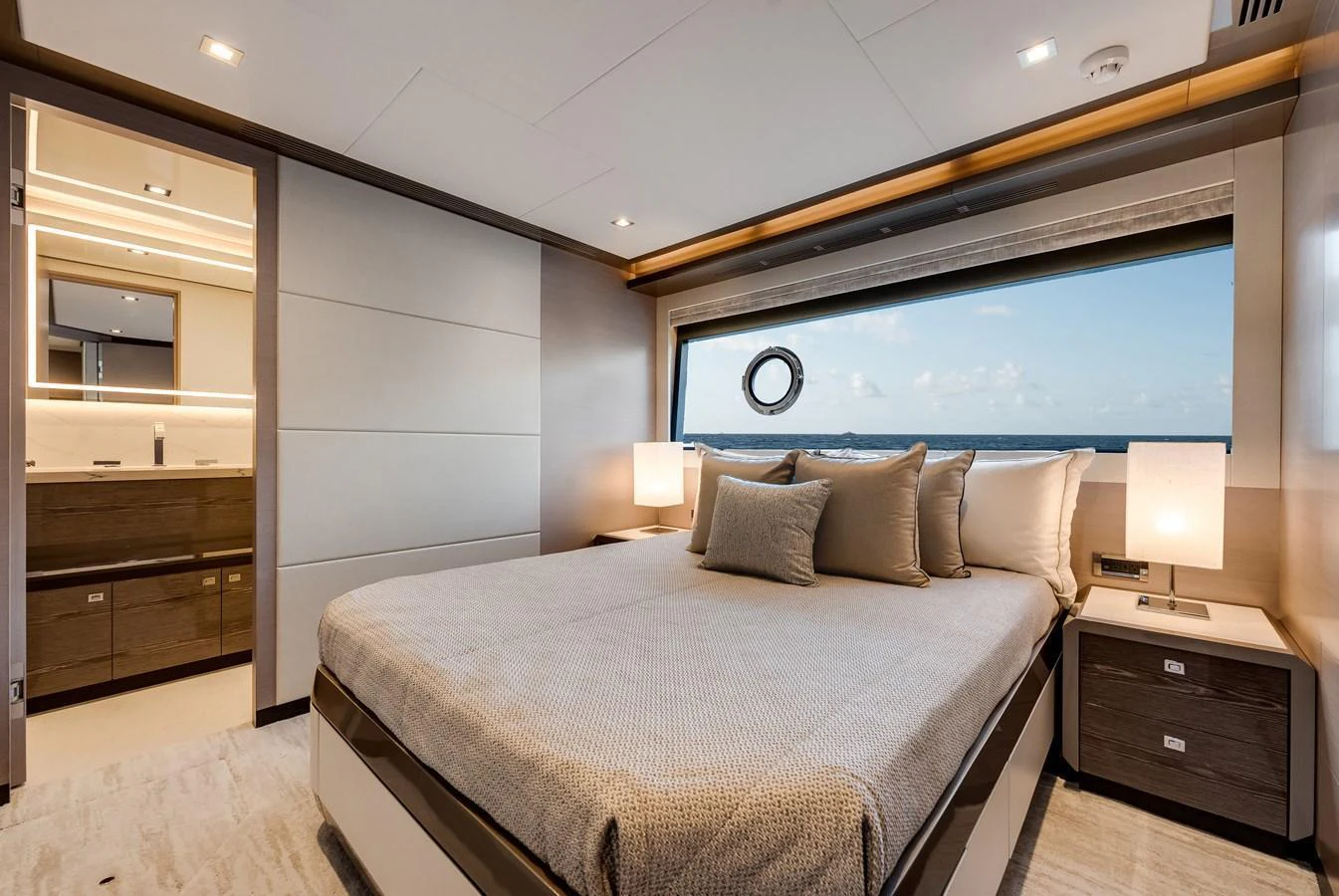 The master stateroom offers a luxurious and serene retreat with a stunning ocean view. aboard CHAOS Yacht for Sale