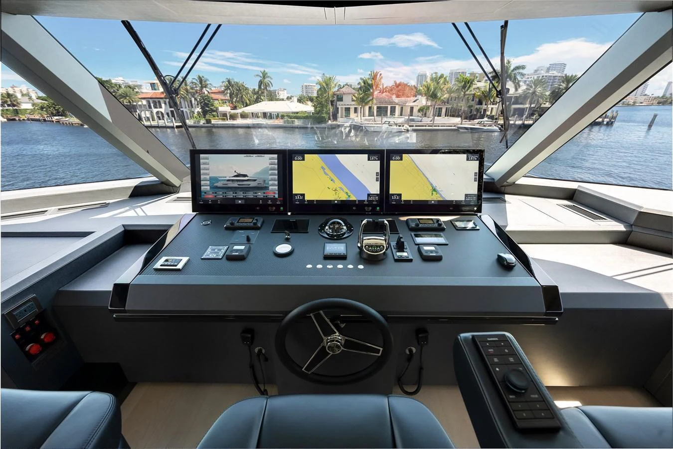 The helm station offers advanced navigation technology with a panoramic view of the waterway. aboard CHAOS Yacht for Sale