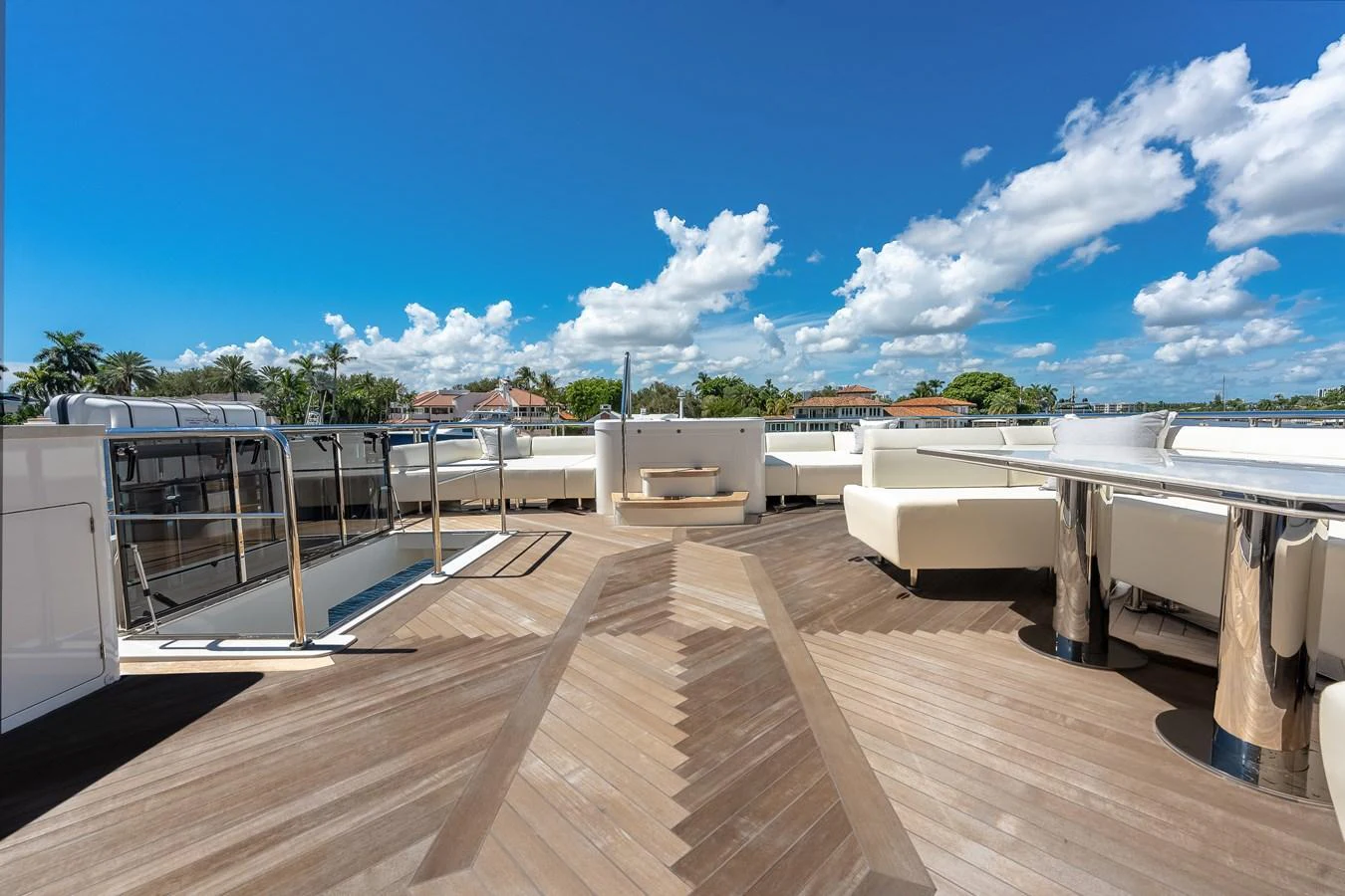 The sundeck offers a spacious area with luxurious seating and beautiful views. aboard CHAOS Yacht for Sale