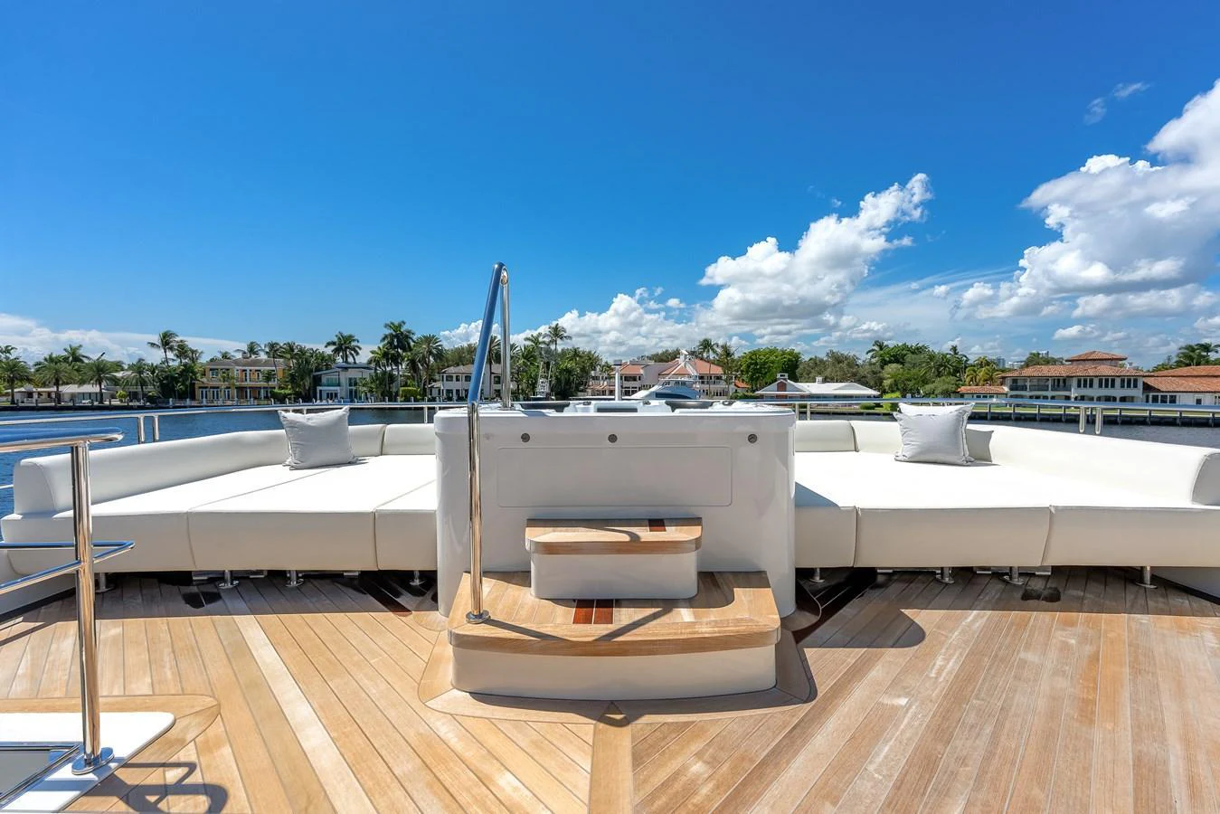 The sundeck offers a spacious and inviting area for relaxation with plush seating and scenic views. aboard CHAOS Yacht for Sale
