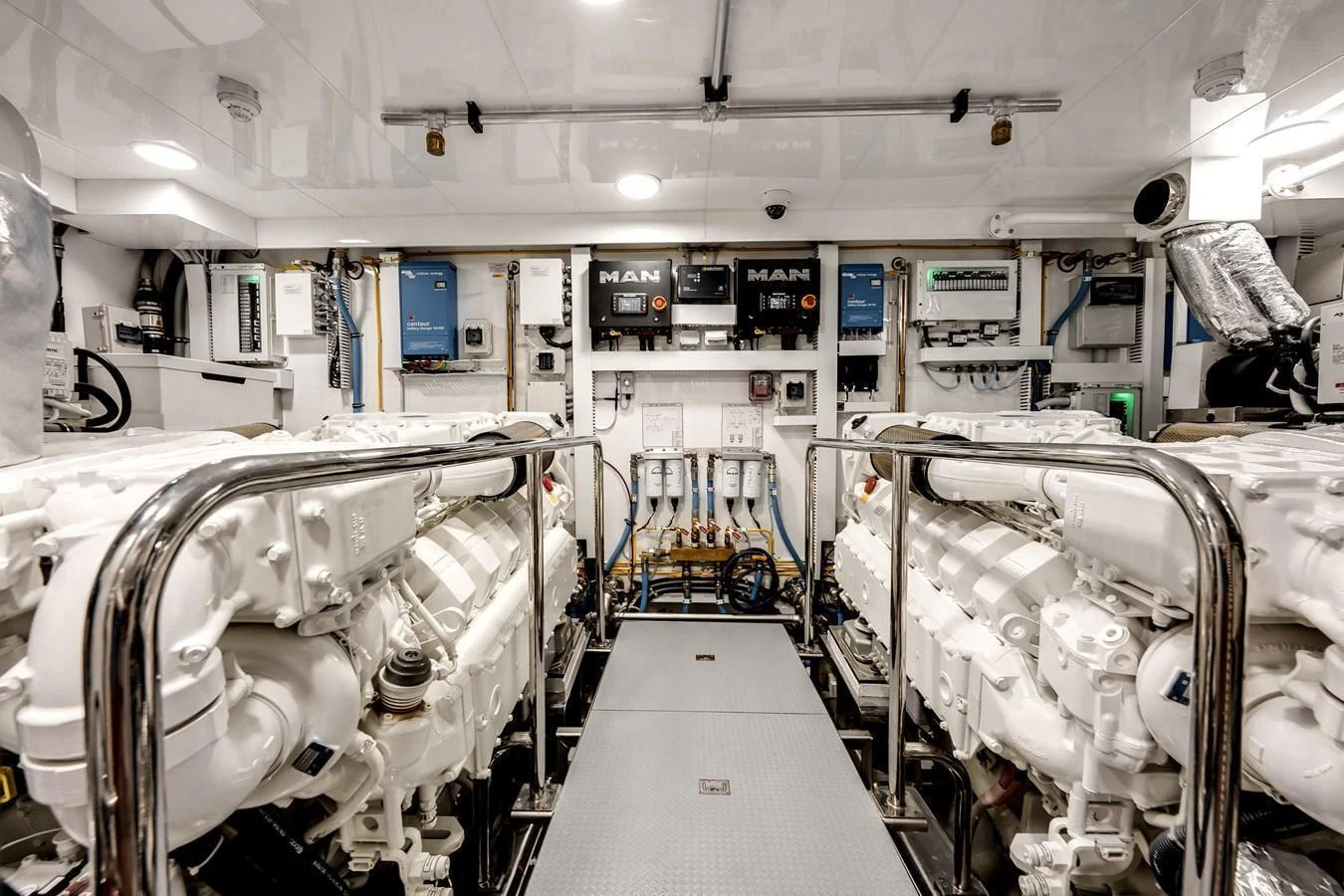 The engine room is meticulously organized, showcasing powerful machinery and advanced systems. aboard CHAOS Yacht for Sale