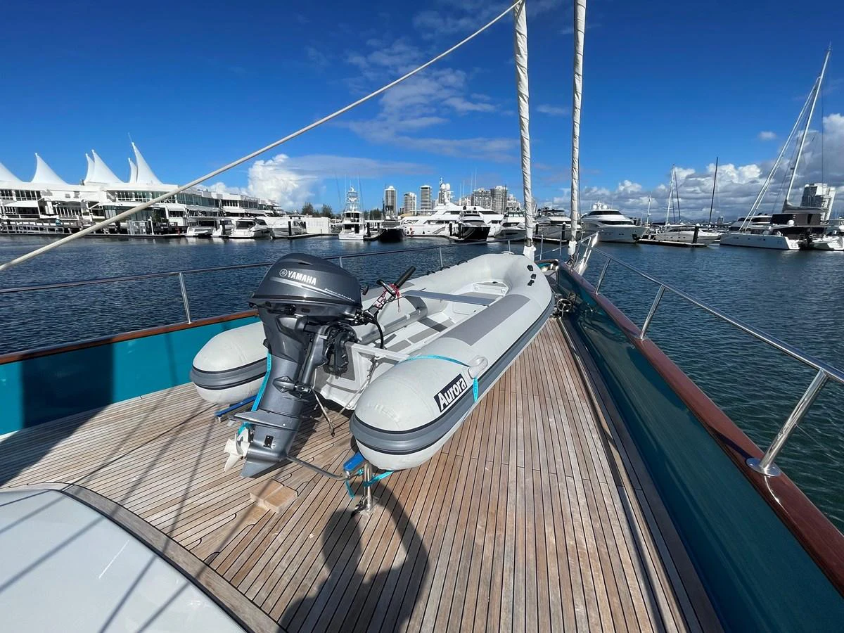 A sleek tender is securely fastened on the yacht's deck, ready for adventures on the water. aboard SV TEAL Yacht for Sale