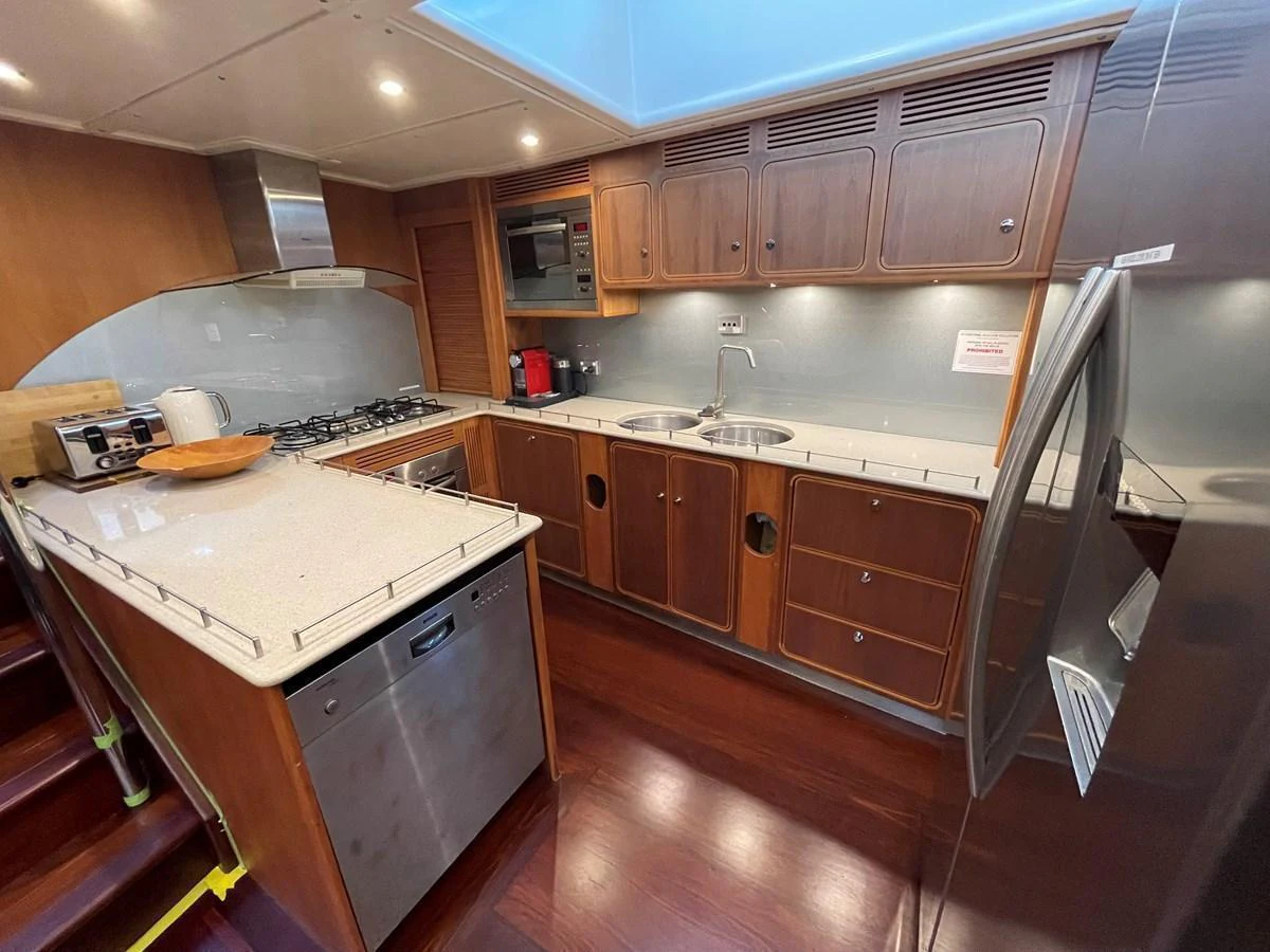 The yacht's galley is equipped with modern appliances and ample counter space. aboard SV TEAL Yacht for Sale