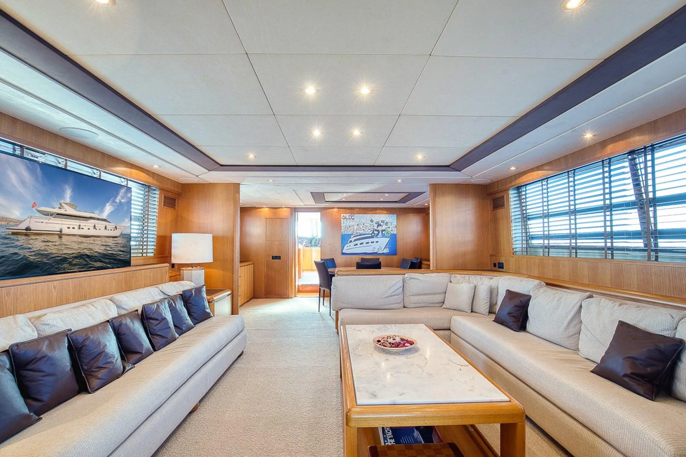 The spacious salon features plush seating and elegant decor, perfect for relaxation and socializing. aboard D-FORCE Yacht for Sale