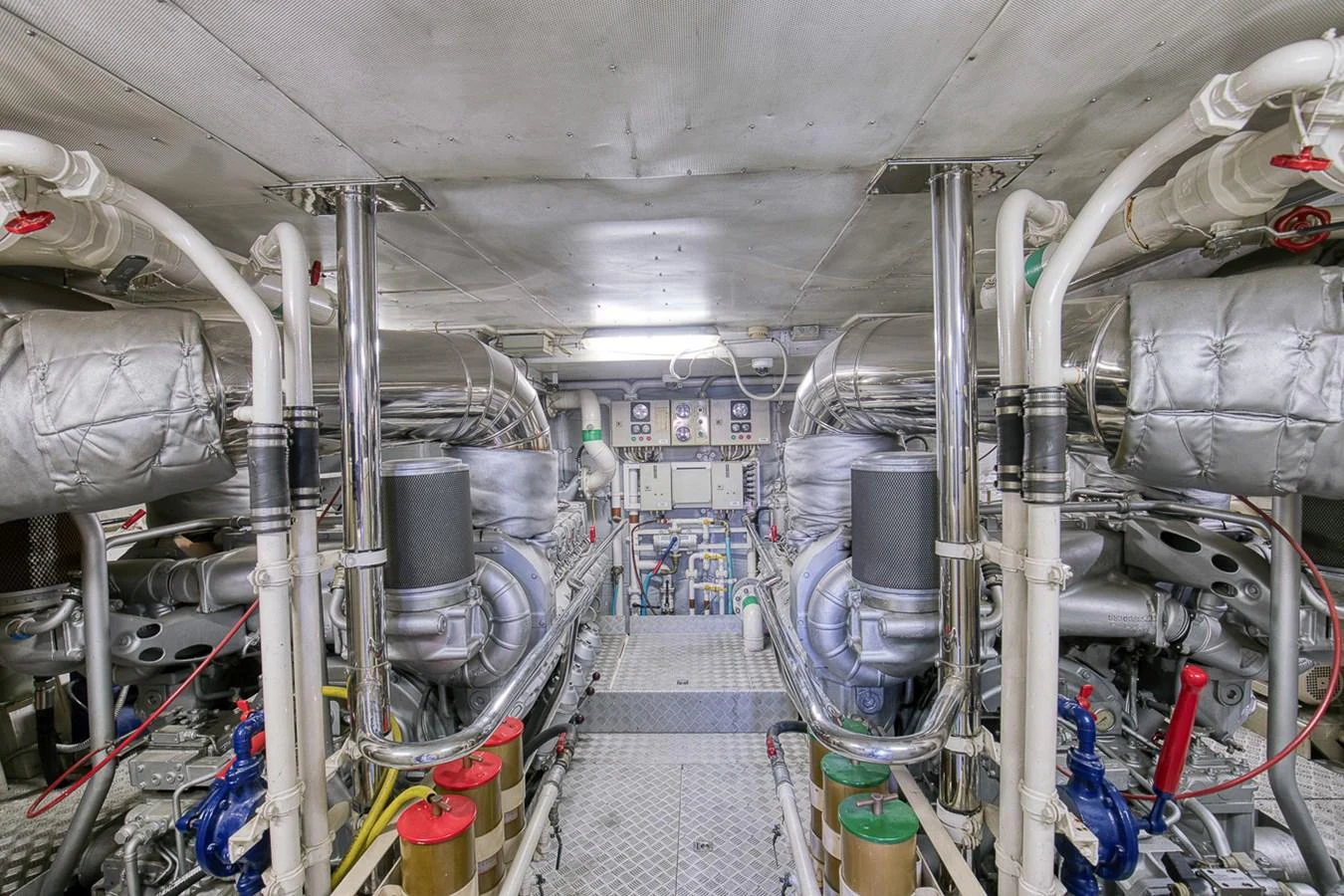 The image showcases the yacht's well-maintained engine room with advanced machinery and equipment. aboard D-FORCE Yacht for Sale