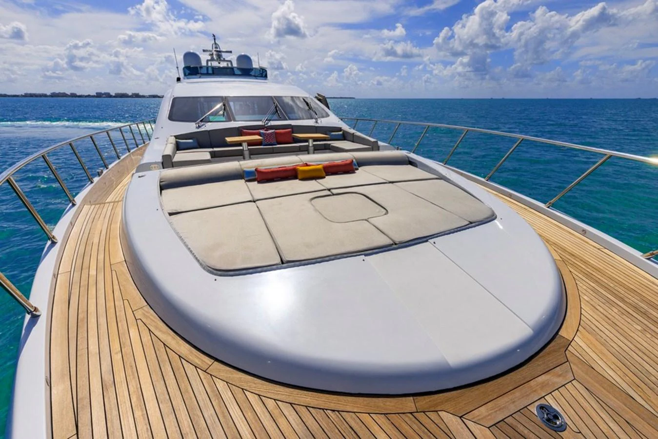 The yacht's spacious foredeck features luxurious sun pads and a stunning view of the open sea. aboard SAYONARA Yacht for Sale