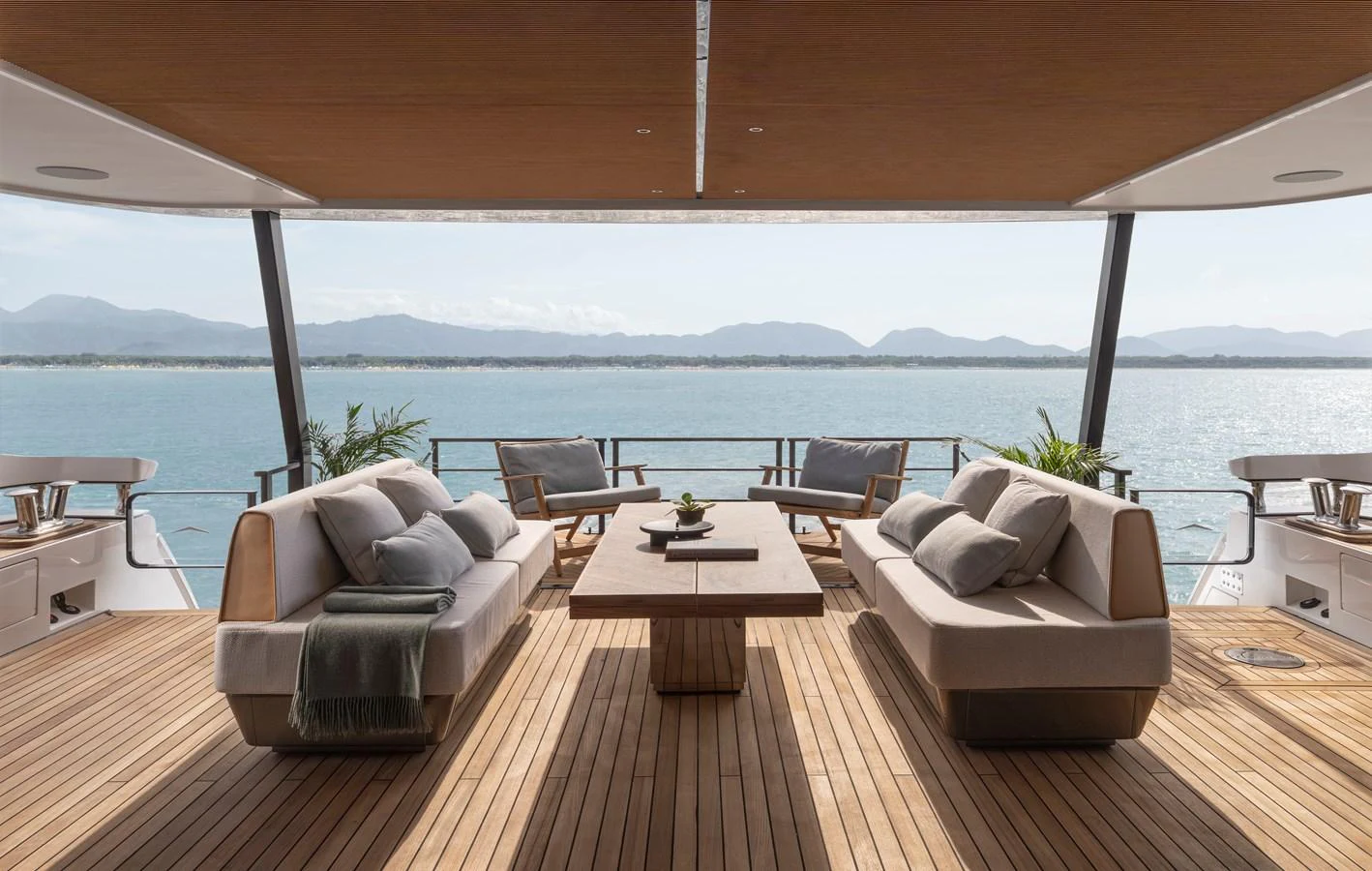 The aft deck features elegant seating with a stunning view of the sea. aboard AZIMUT GRANDE 30M NEW Yacht for Sale