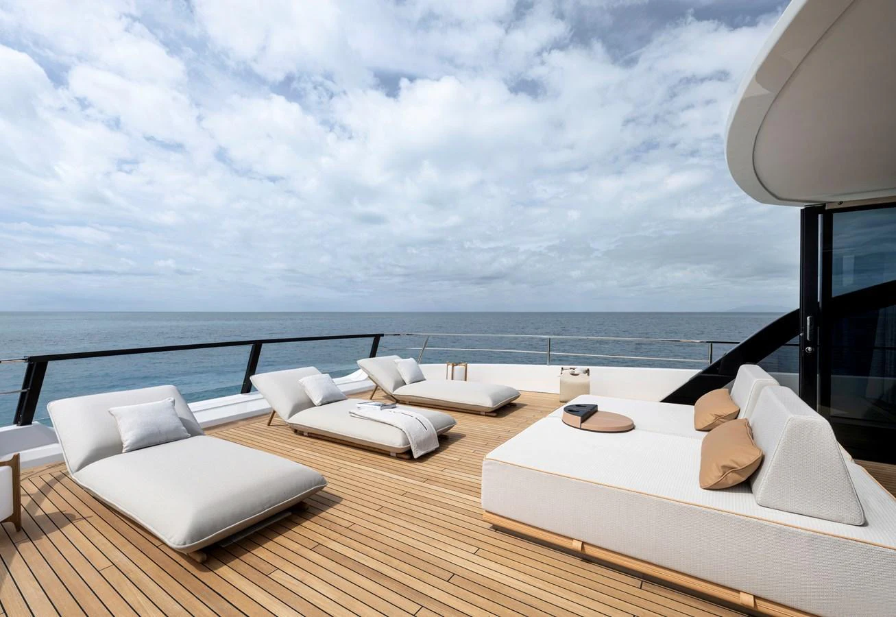 The sundeck features luxurious lounge chairs and sofas with a stunning ocean view. aboard AZIMUT GRANDE 30M NEW Yacht for Sale