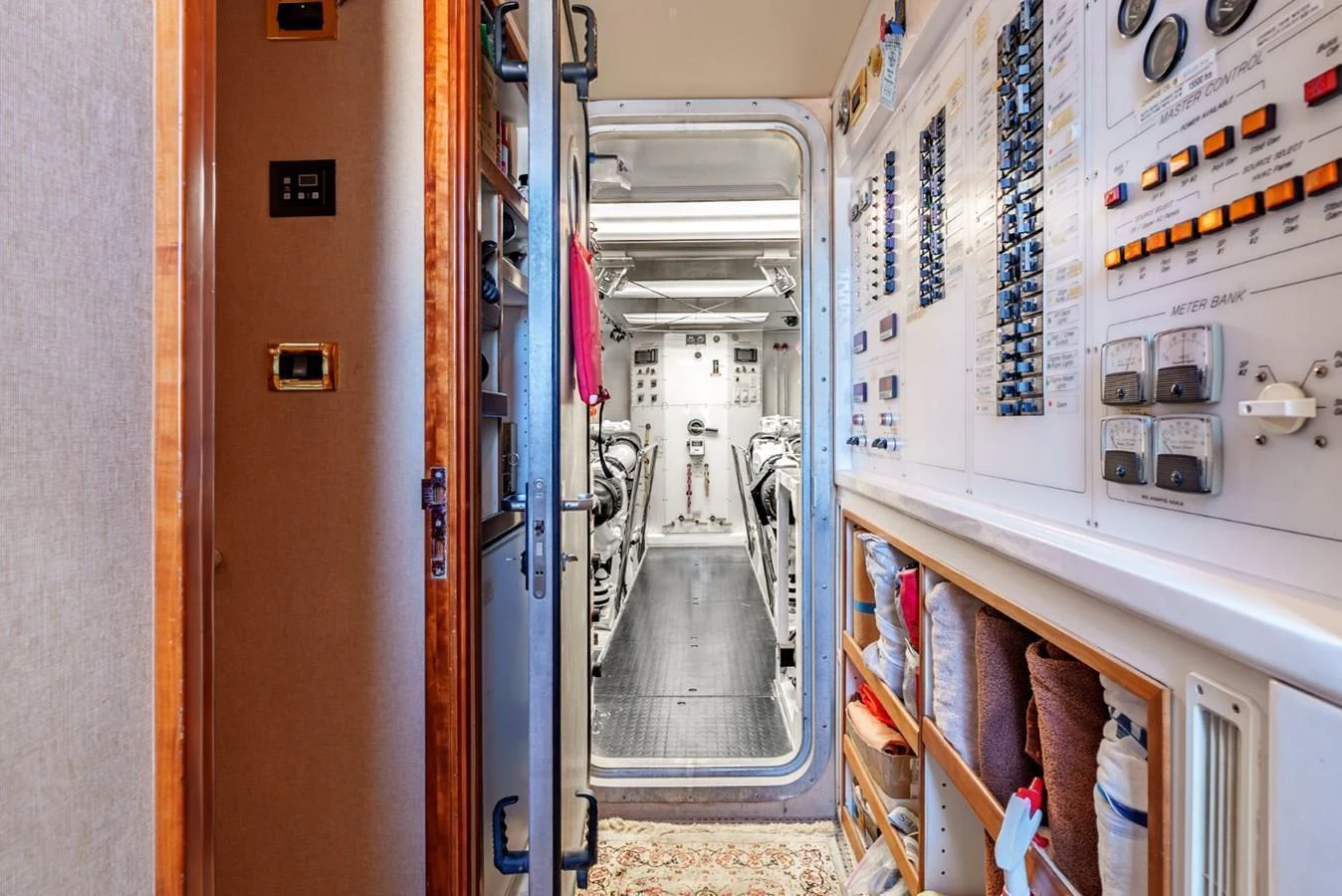 The yacht's engine room is meticulously organized, showcasing advanced control panels and equipment. aboard SNOWBORED Yacht for Sale
