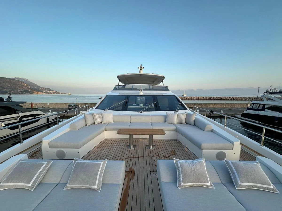 The yacht's foredeck features spacious and luxurious seating with stunning views of the surrounding marina. aboard G Yacht for Sale