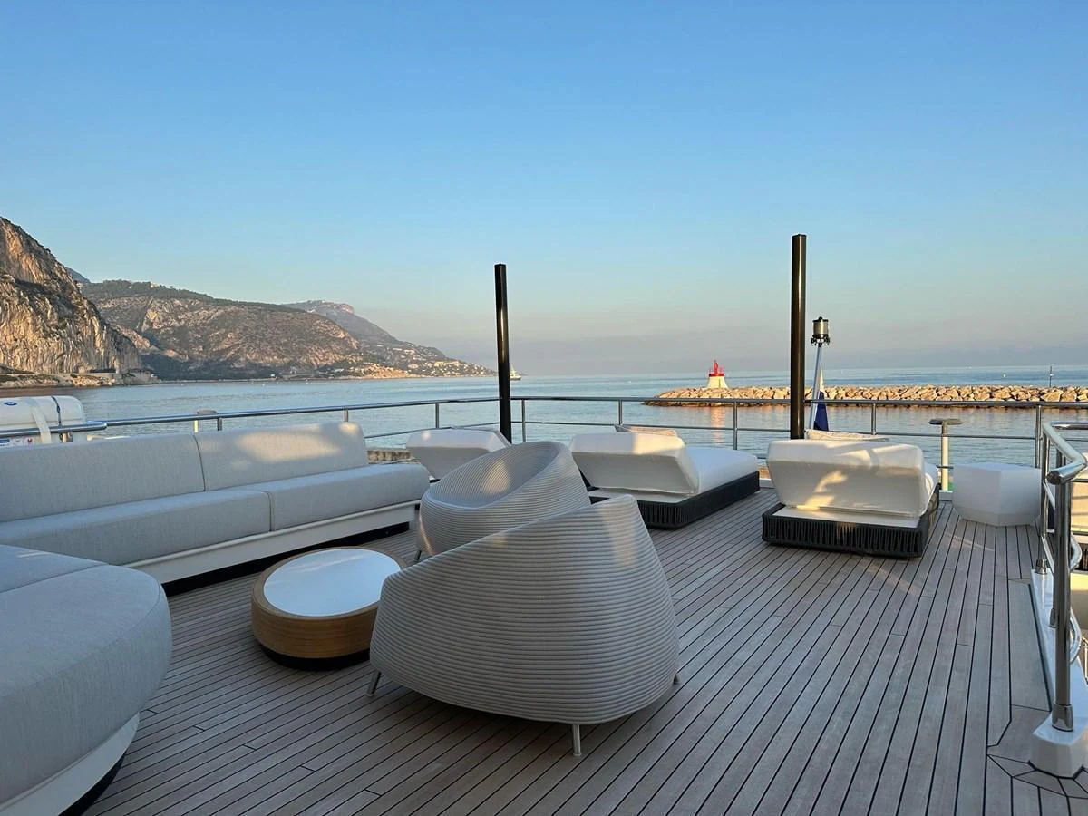 The sundeck offers a spacious and serene area with comfortable seating and stunning views of the coastline. aboard G Yacht for Sale