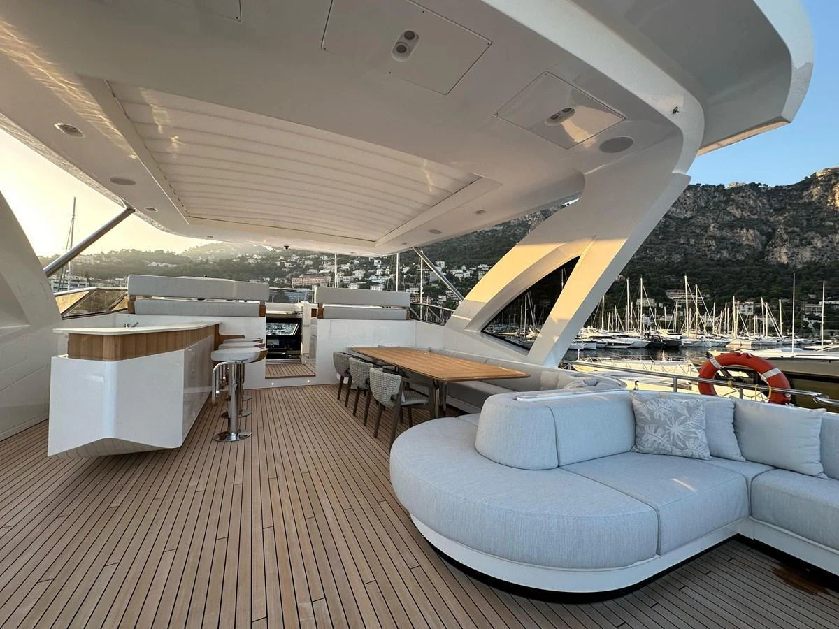 The aft deck features a spacious seating area with a modern design, perfect for relaxation and dining. aboard G Yacht for Sale