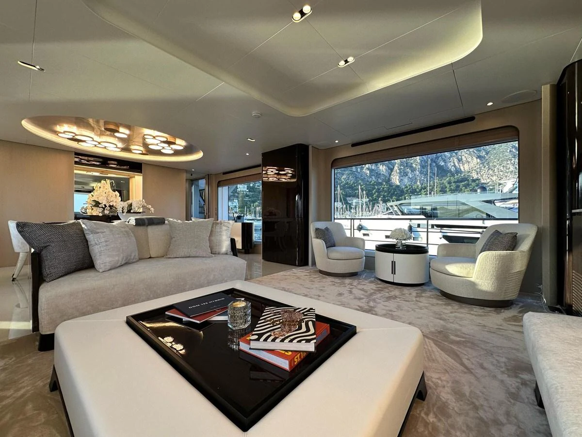 The salon offers a luxurious and spacious area with modern furnishings and large windows providing stunning views. aboard G Yacht for Sale