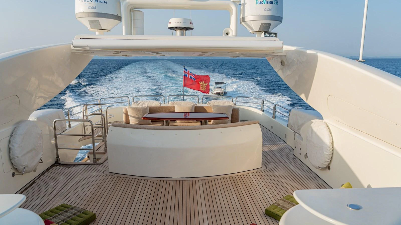 The aft deck offers a spacious and inviting area for relaxation with a stunning view of the open sea. aboard LIMION Yacht for Sale