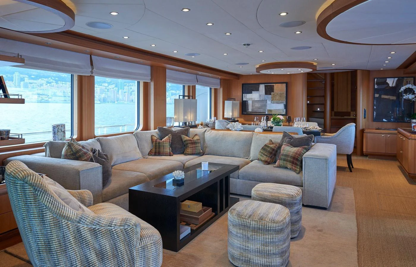 The yacht's salon features a spacious and comfortable seating area with large windows offering stunning views. aboard GALENA Yacht for Sale