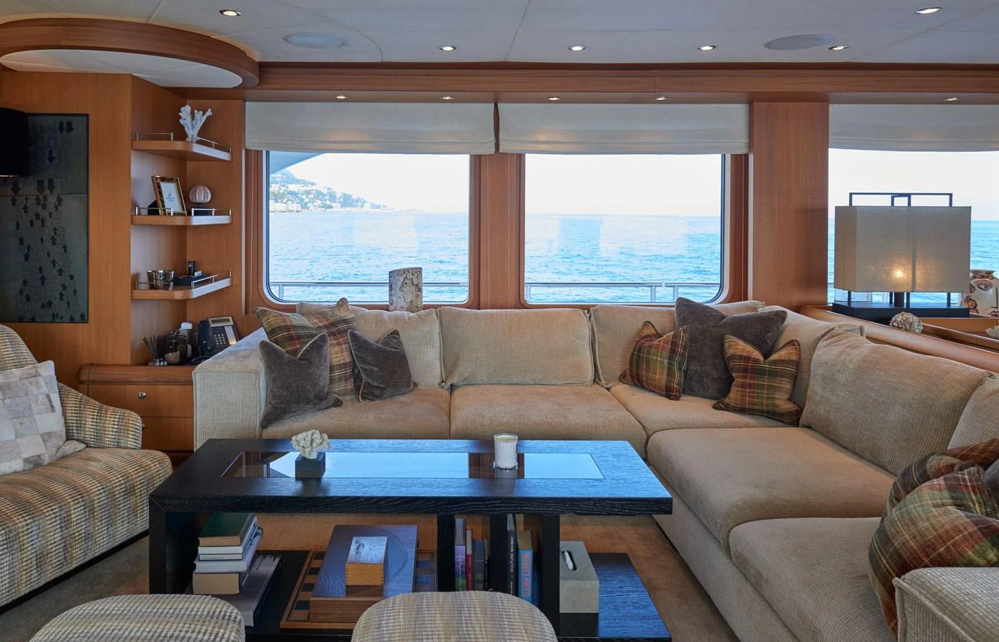 The salon features a spacious and comfortable seating area with large windows offering stunning ocean views. aboard GALENA Yacht for Sale