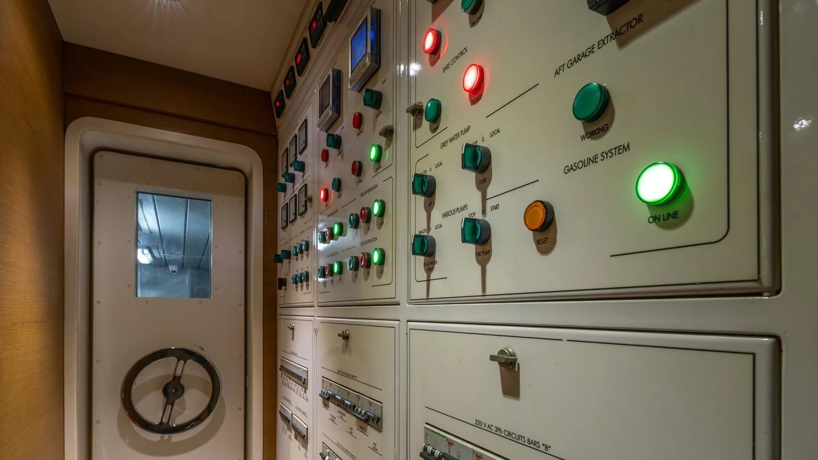The yacht's control room features an array of switches and indicators for various systems. aboard EROSSEA Yacht for Sale