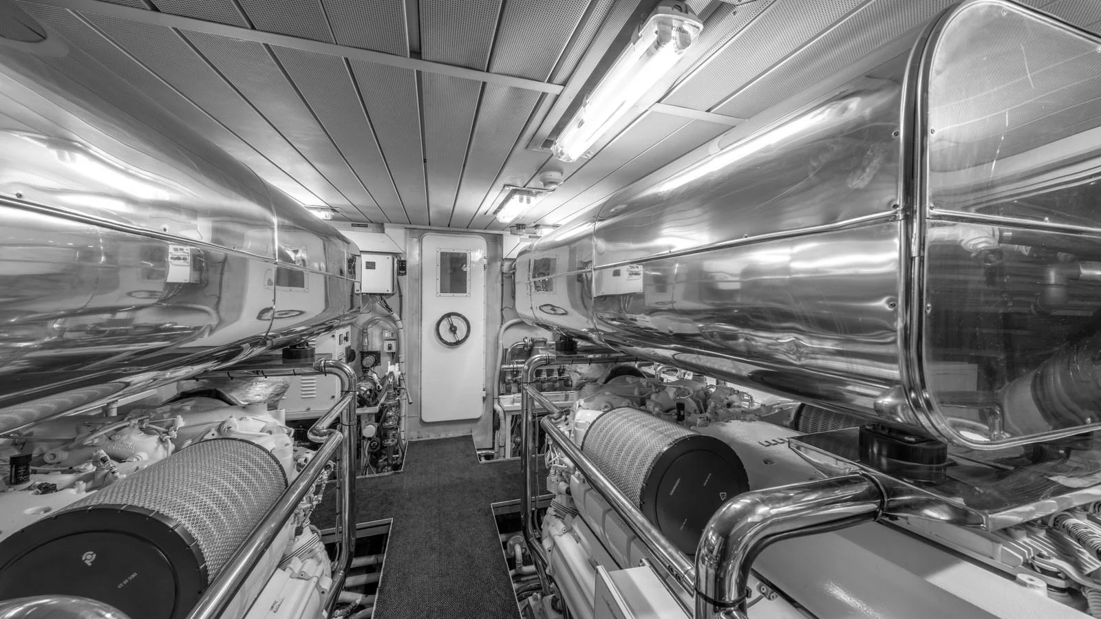 The engine room showcases the yacht's powerful and meticulously maintained machinery. aboard EROSSEA Yacht for Sale