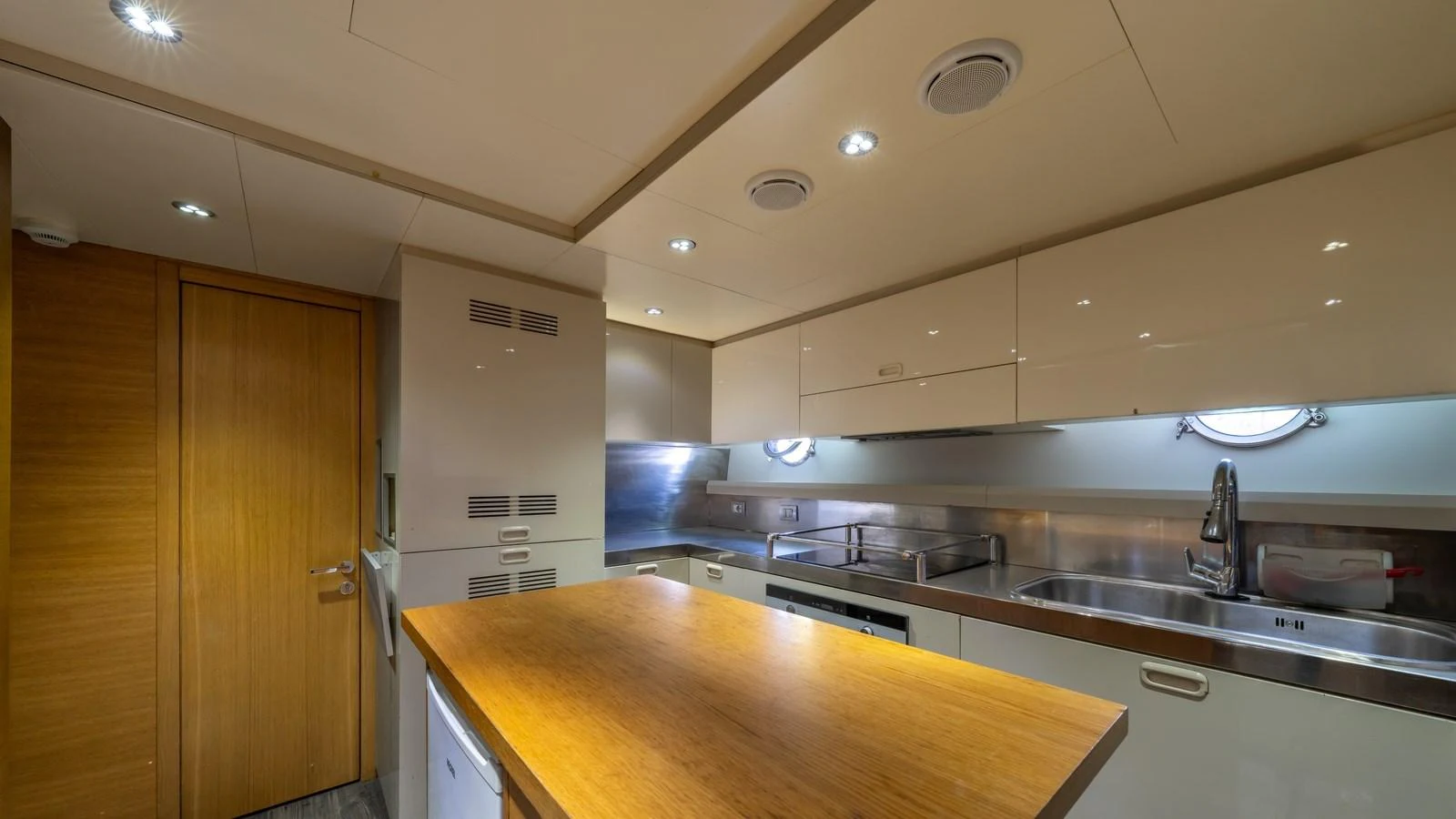 The galley features modern appliances and ample counter space for gourmet meal preparation. aboard EROSSEA Yacht for Sale