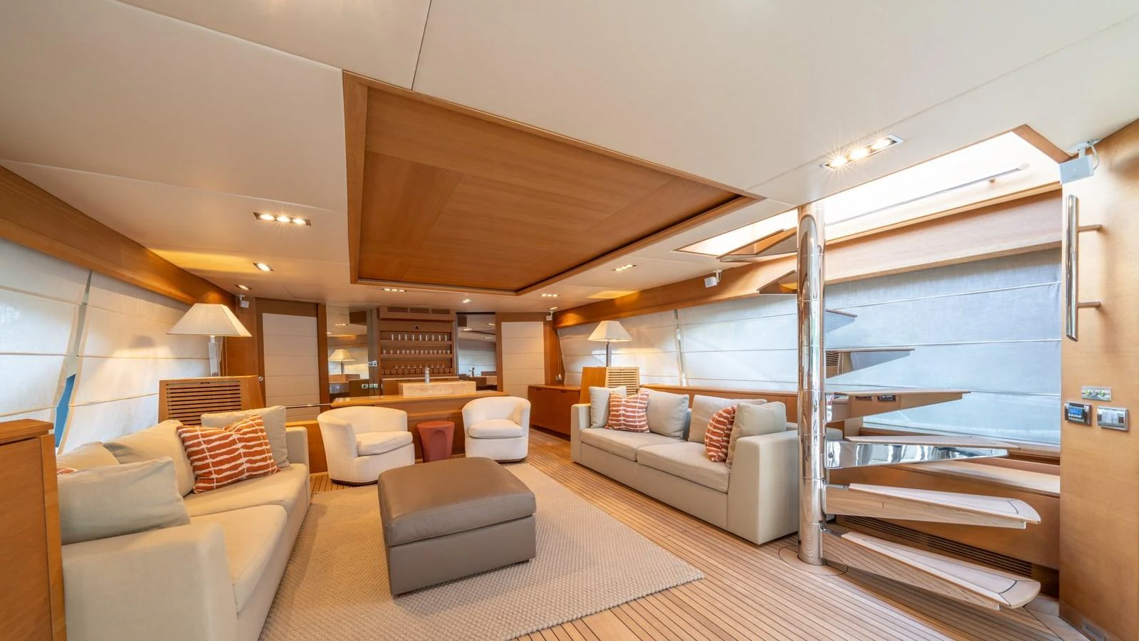 The salon features a spacious and elegantly designed seating area with modern furnishings and ample natural light. aboard EROSSEA Yacht for Sale