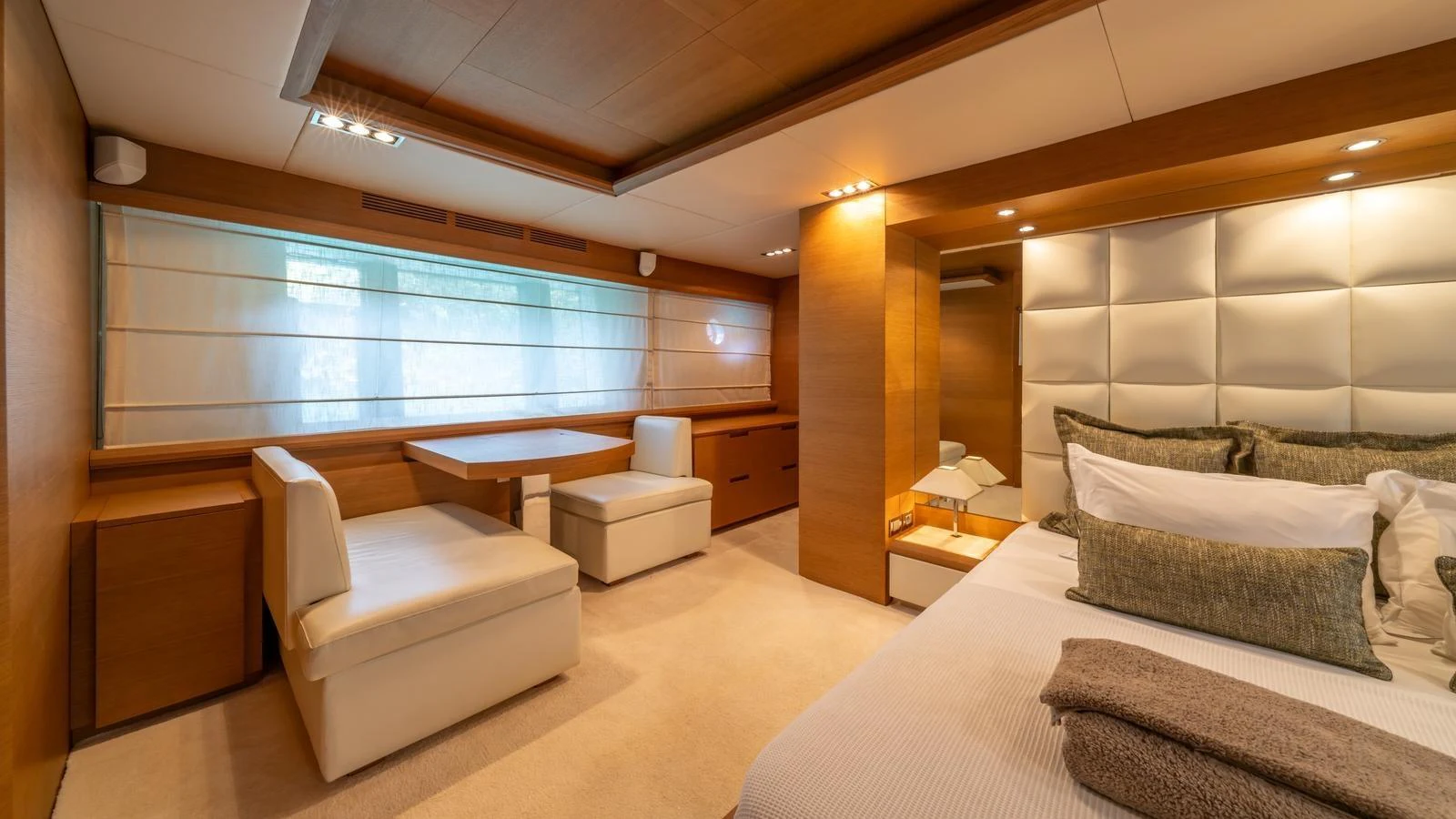 The master stateroom exudes luxury with its spacious layout and elegant furnishings. aboard EROSSEA Yacht for Sale