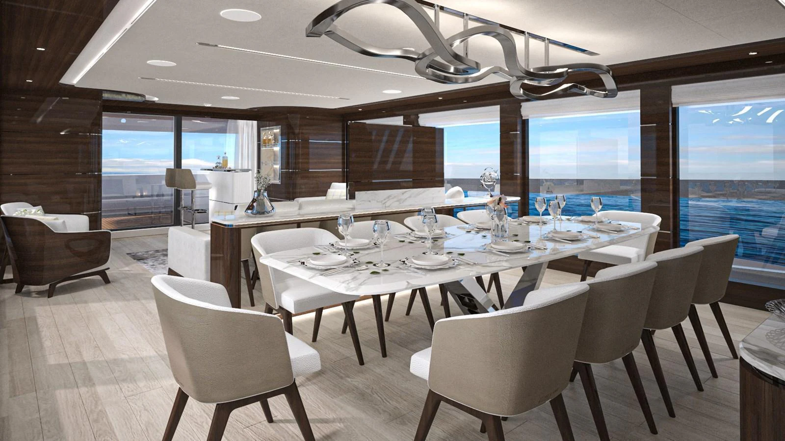 The yacht's dining area features a modern and elegant setting with panoramic ocean views. aboard LAZZARA UHV 90 Yacht for Sale