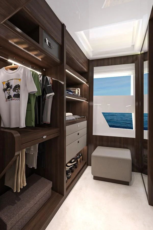 A well-organized yacht closet with ample storage and a view of the sea. aboard LAZZARA UHV 90 Yacht for Sale