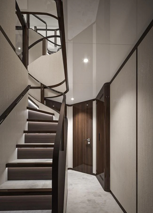 A modern staircase with sleek lines and elegant finishes enhances the yacht's interior. aboard LAZZARA UHV 90 Yacht for Sale