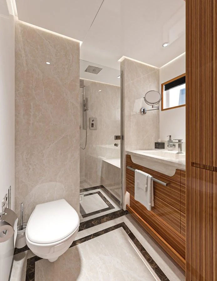 The yacht's bathroom features a sleek design with modern fixtures and luxurious finishes. aboard LAZZARA UHV 90 Yacht for Sale