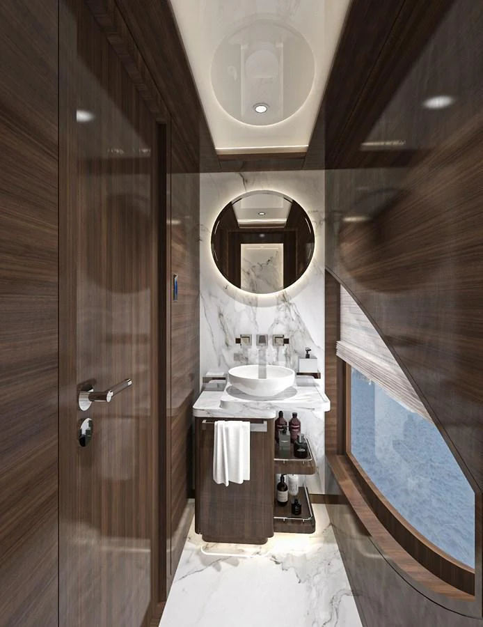 A luxurious yacht bathroom featuring elegant wood paneling and a modern sink with a round mirror. aboard LAZZARA UHV 90 Yacht for Sale