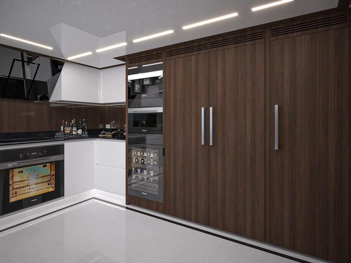 The modern galley features sleek wooden cabinetry and state-of-the-art appliances. aboard LAZZARA UHV 90 Yacht for Sale