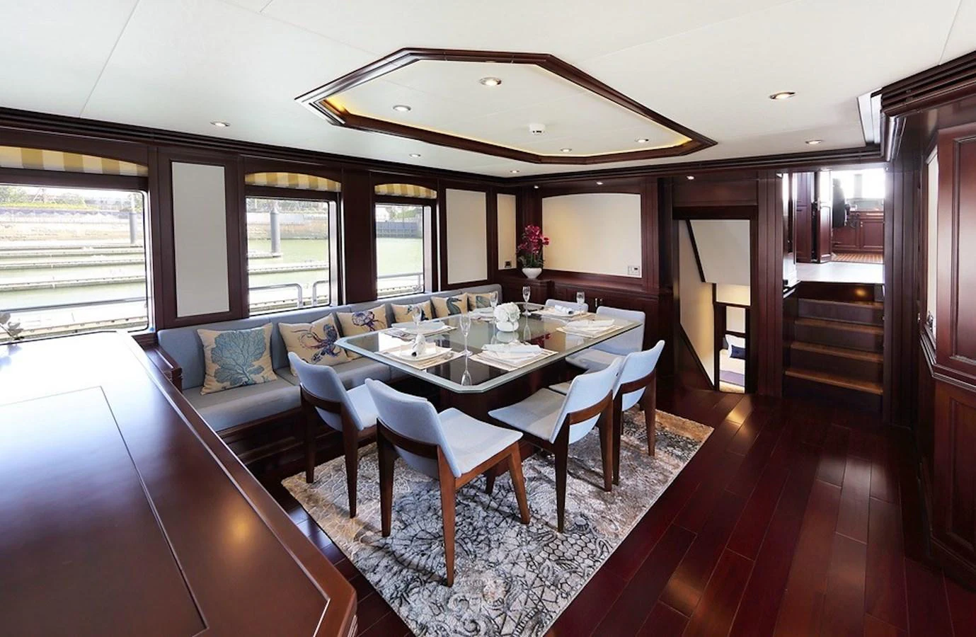 The yacht's dining area features elegant seating and a sophisticated ambiance. aboard SAMSARA Yacht for Sale