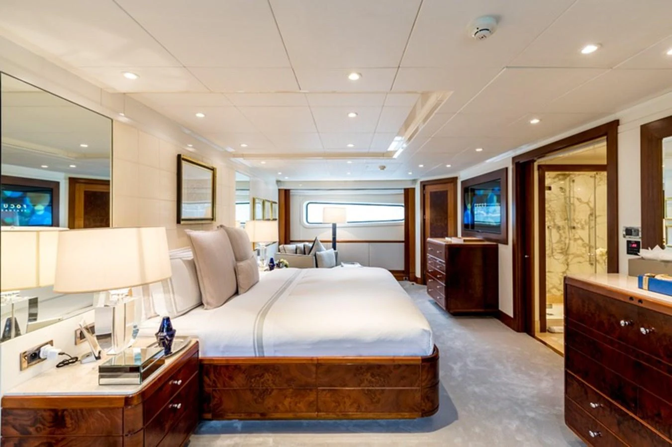 The master stateroom features a spacious layout with luxurious furnishings and ample natural light. aboard LA TANIA Yacht for Sale