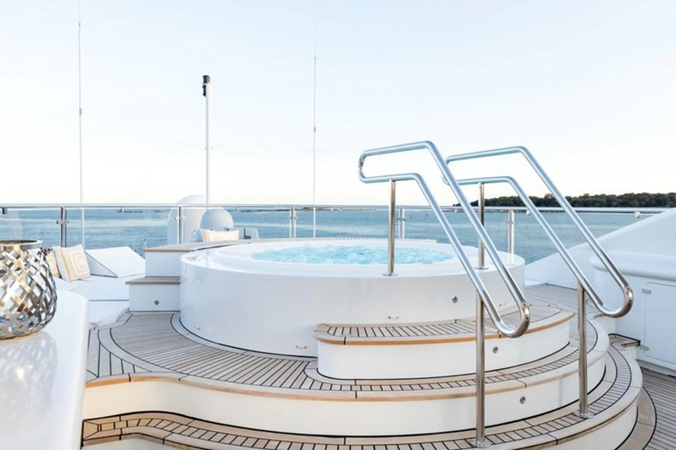 The sundeck features a luxurious hot tub with a stunning ocean view. aboard LA TANIA Yacht for Sale