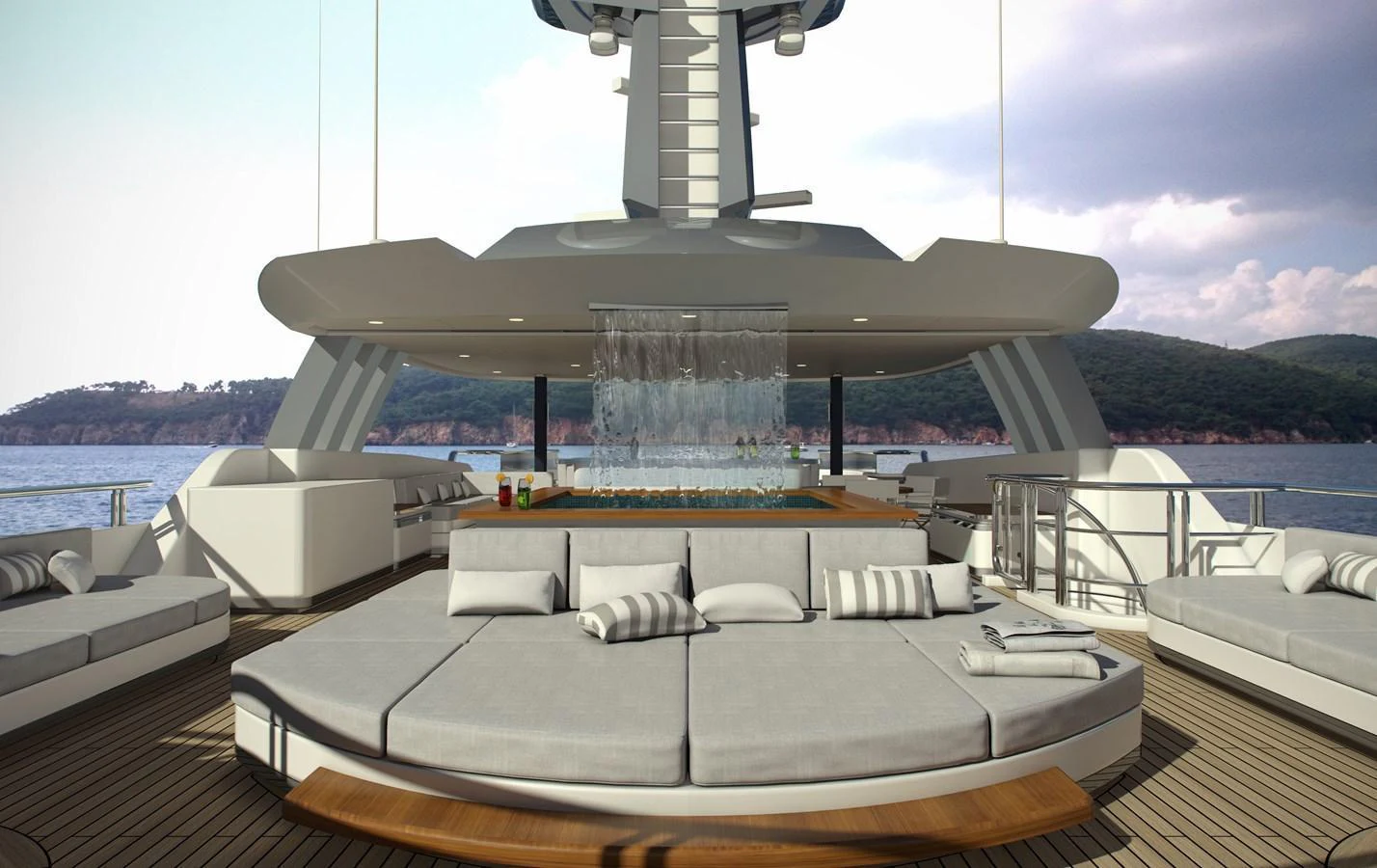 The sundeck features a luxurious lounging area with a central water feature, offering a perfect spot for relaxation. aboard CMB47-107 Yacht for Sale