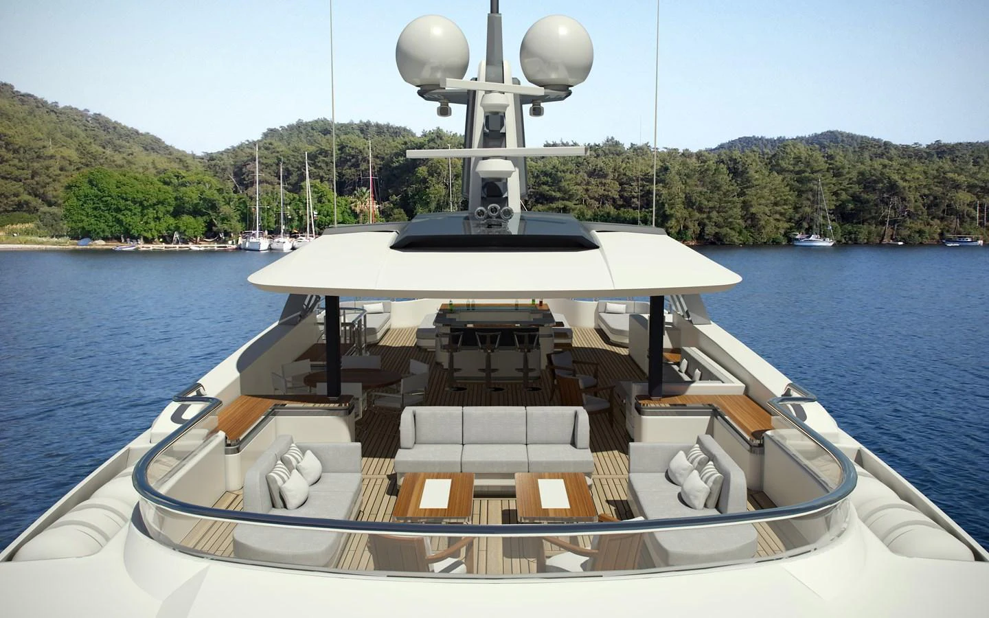 The flybridge offers a luxurious outdoor seating area with ample shade and scenic views. aboard CMB47-107 Yacht for Sale