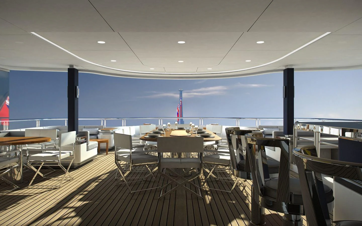 The aft deck features a spacious and elegant dining area with panoramic ocean views. aboard CMB47-107 Yacht for Sale