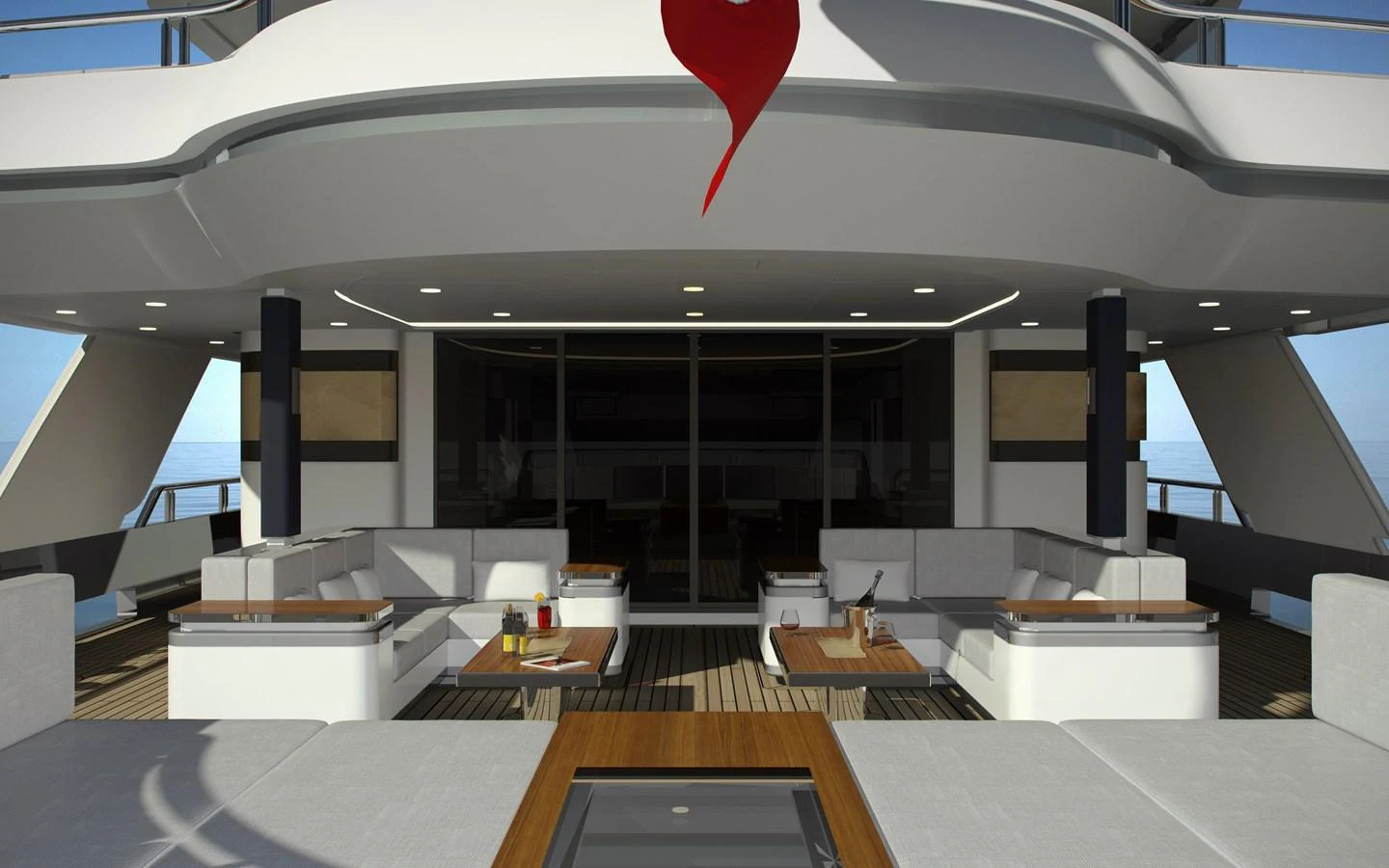 The aft deck features a spacious seating area with modern furnishings and a sleek design. aboard CMB47-107 Yacht for Sale