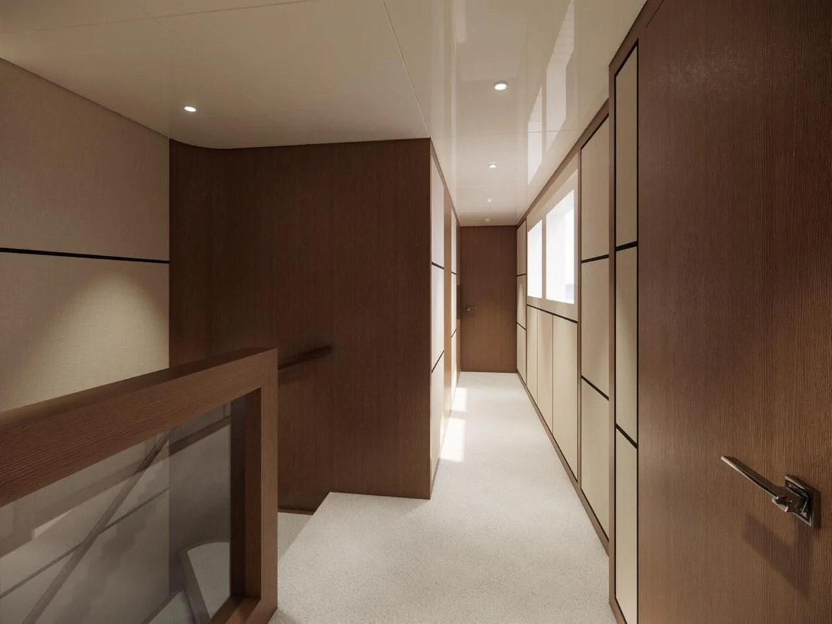 The yacht's interior hallway features modern wood paneling and soft lighting. aboard CMB47-107 Yacht for Sale