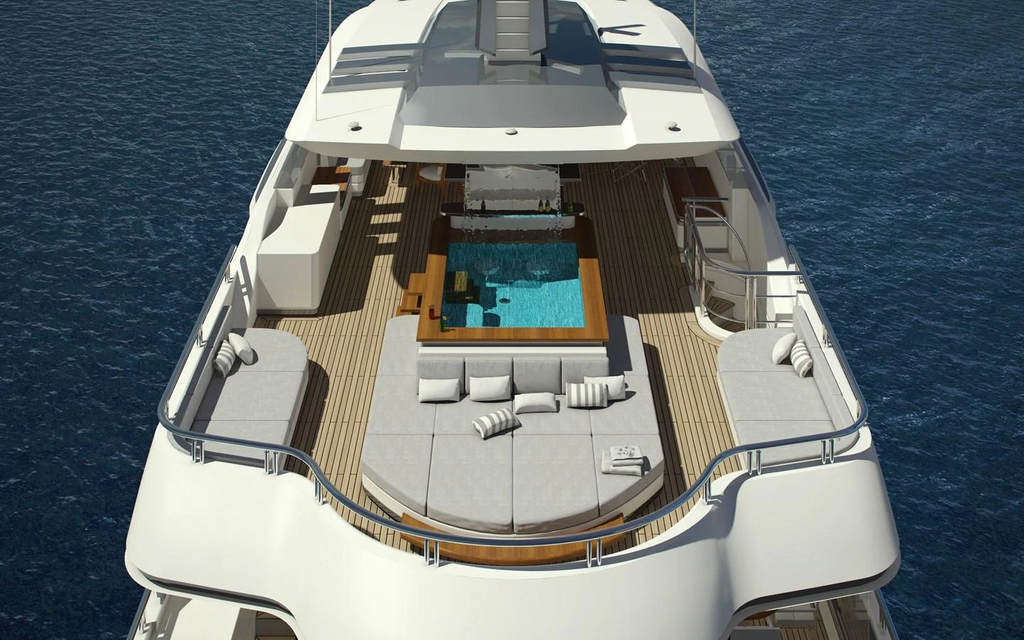 The sundeck features a luxurious pool surrounded by ample lounging space and elegant design. aboard CMB47-107 Yacht for Sale