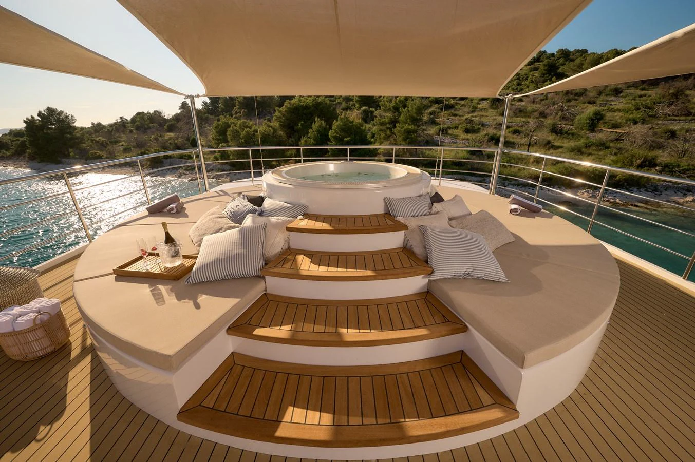 The sundeck features a luxurious jacuzzi surrounded by comfortable seating and sun pads, perfect for relaxation. aboard BELLEZZA Yacht for Sale
