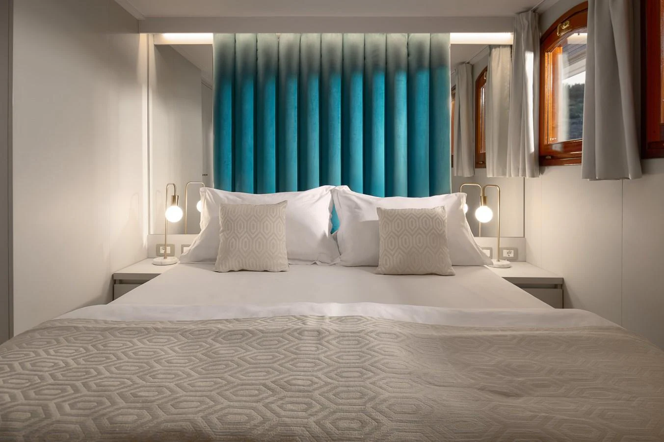A cozy stateroom with a comfortable bed and elegant decor. aboard BELLEZZA Yacht for Sale