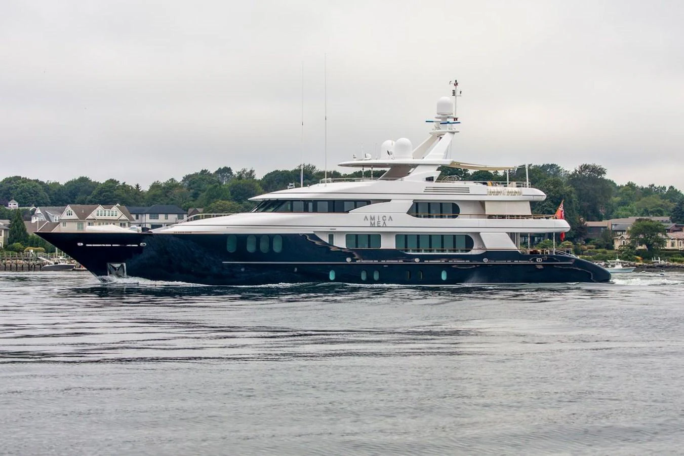 a large boat on the water aboard AMICA MEA Yacht for Sale
