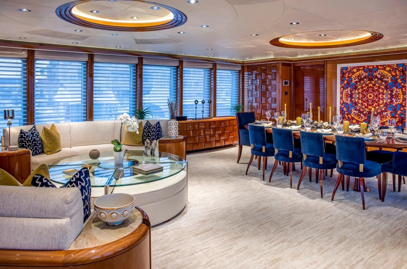 a large room with tables and chairs aboard AMICA MEA Yacht for Sale