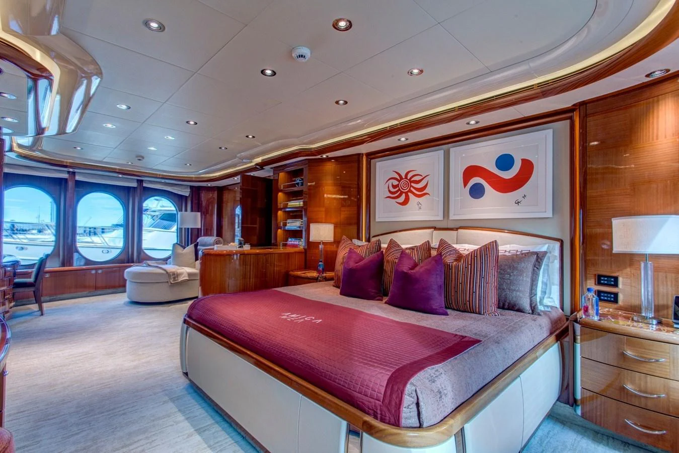 a large bed in a room aboard AMICA MEA Yacht for Sale