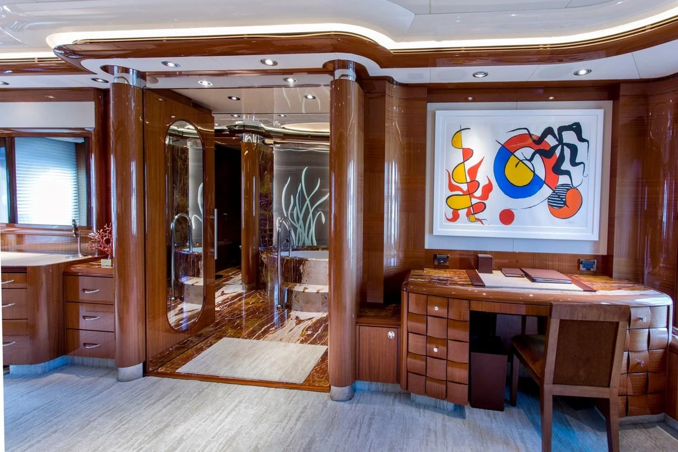 a room with a desk and a chair aboard AMICA MEA Yacht for Sale