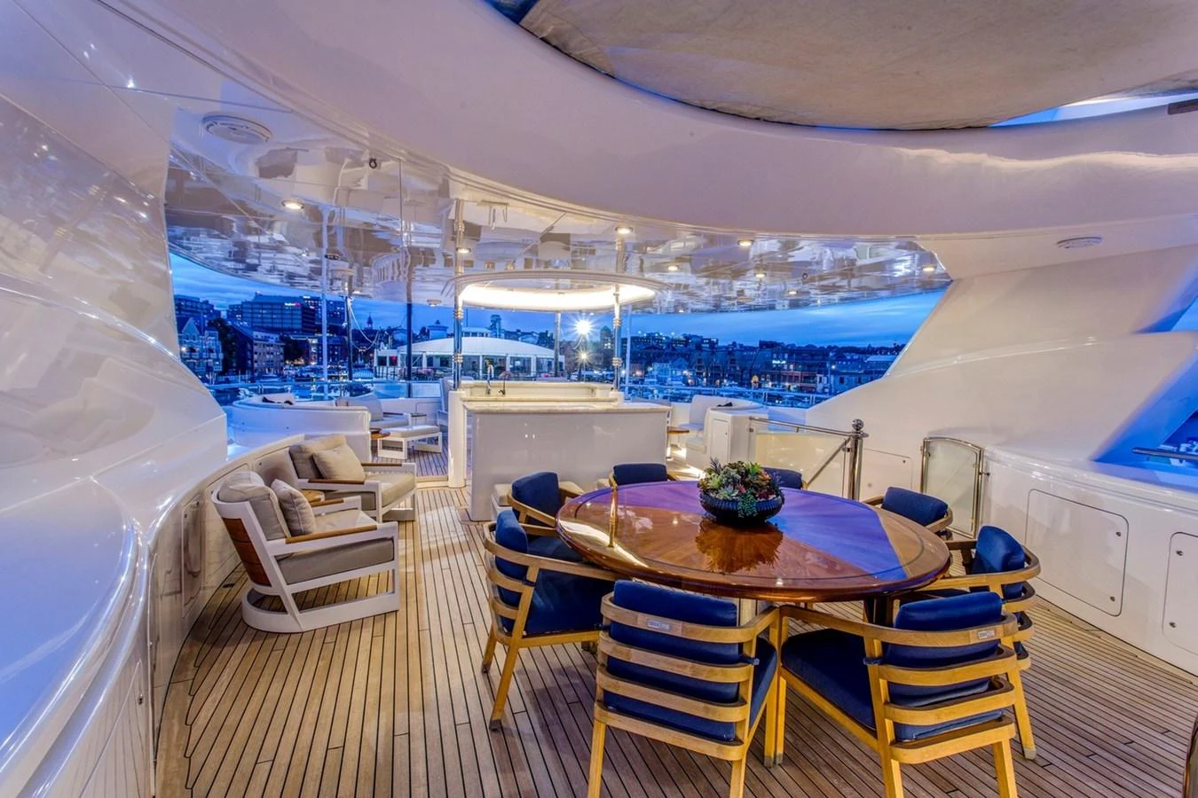 a room with a table and chairs aboard AMICA MEA Yacht for Sale